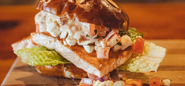 Enjoy a salmon sandwich from Ravinia Bay in Wisconsin Dells.